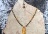 green/yellow jasper beads and orange agate beads. Bumblebee jasper pendant wrapped with Tree of Life. Length 27 in. Item #19-2-1. Price $50.00. 