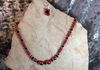 red and black beads with crystal spacer. Length 25.5. Item #19-2-7. Price $15.00