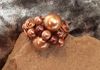 charming simulated pearl ring with copper wrap. Any size, many colors. Item #19-2-9. Price $10.00