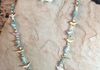 Abalone shell birds with amazonite chips and mother of pearl bird hanger. Length 22.5. Item #19-1-13. Price $25.00