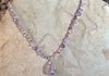 Amethyst and crystal chips, clear glass beads. Rose quartz pendant with wire wrap and Swarovski crystals. length 22.5 in. Item #19-1-15. Price $30.00