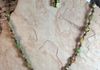 Green jasper beads and brass spacers. Earrings with wire wrap. Length 27.5 in. Item # 18-9-8. Price $20.00