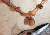Close up of Madagascar stone with copper wire wrap