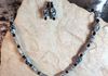 Gray and black glass beads with granite stone pendant. length 22 in. Item #19-1-7. Price $20.00/