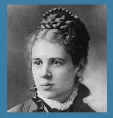 Black and white portrait of a woman with braided hair and Victorian clothing.