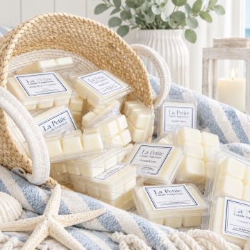 Soy wax melts in a basket with coastal decor.