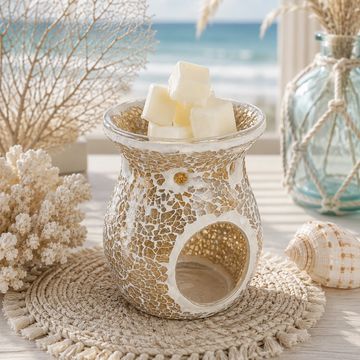 Decorative wax melt burner with wax cubes.