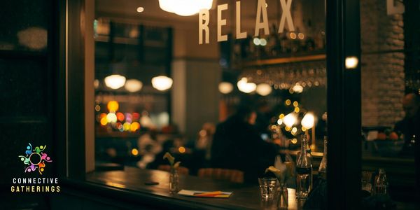 Cozy bar scene with 'RELAX' sign and warm lighting.