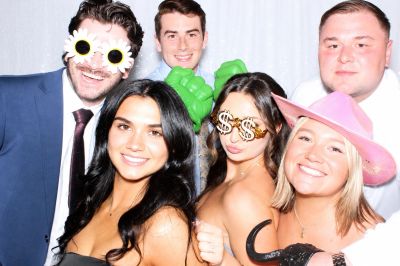 Party guests having fun in a Sarasota photo booth