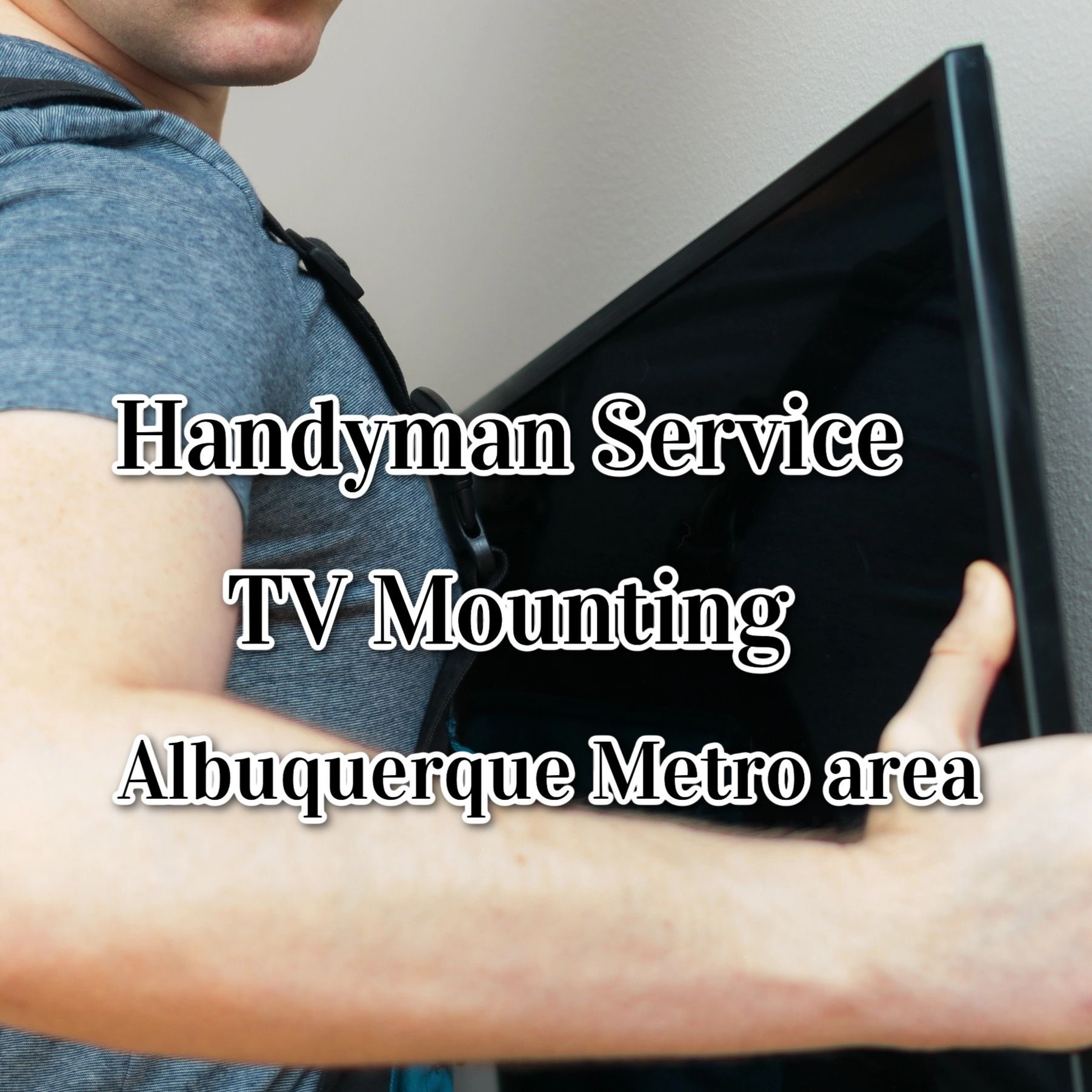 Handyman mounting TV