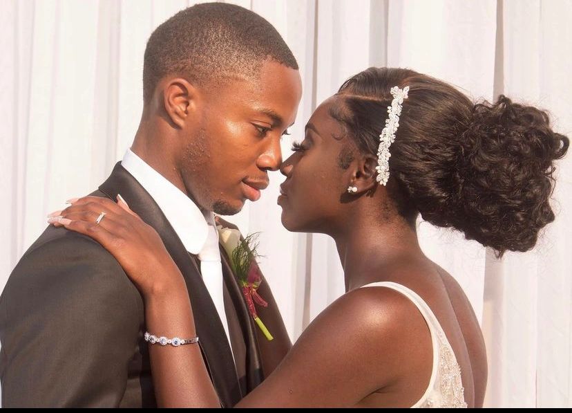 Couple sharing an intimate wedding moment.