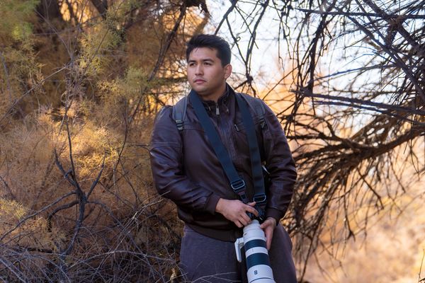 Richard Gonzalez, an accomplished Videographer and Photographer based in El Paso, Texas, captured in a striking profile photo amidst an outdoor shoot.





