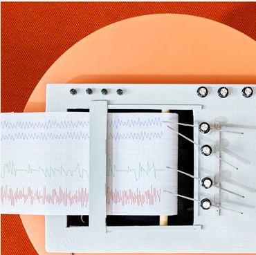 Person undergoing a polygraph test with hand sensor attached.