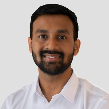 Dr Arjak Pal, Orthodontist. Invisalign & braces provider. Experienced adult child orthodontics NW3