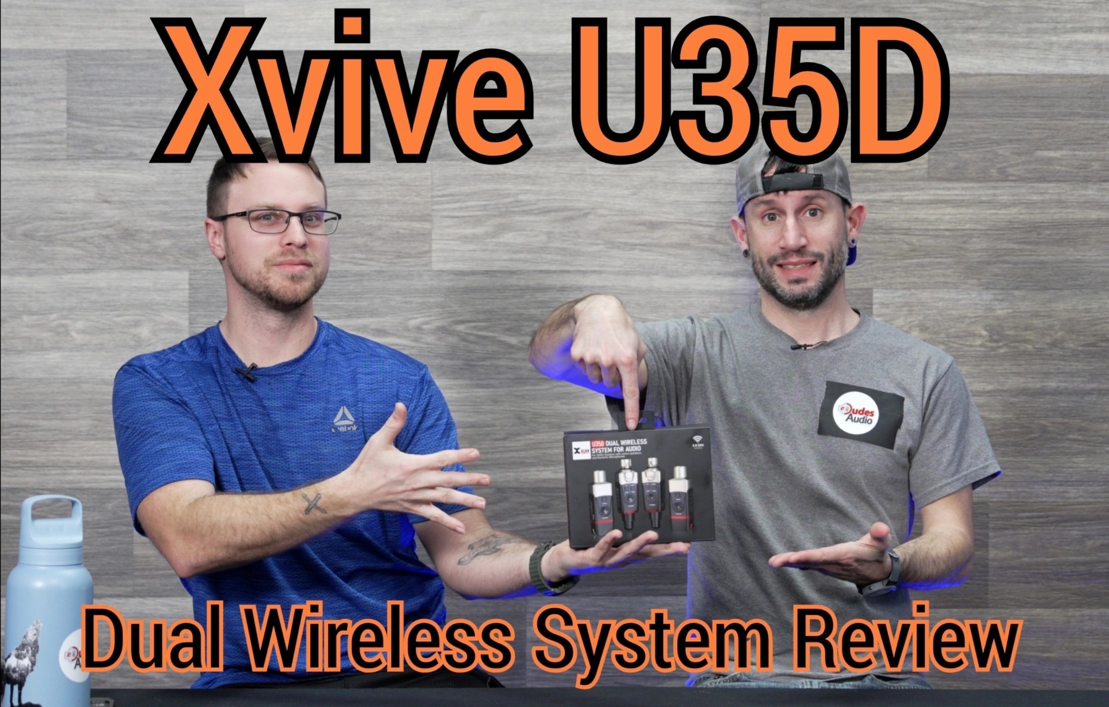 Two men review the Xvive U35D dual wireless audio system.