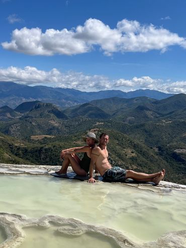 Sitting on the edge of one of the petrifed waterfalls at Hierve el Aqua.