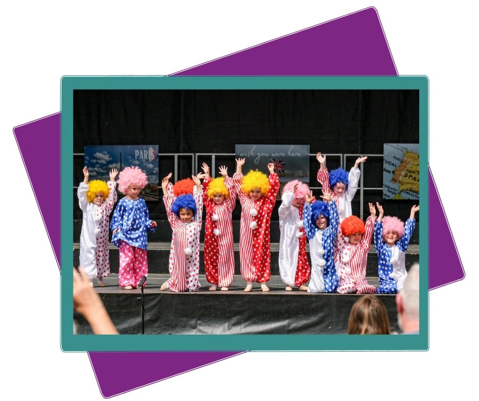 Group of smiley dancing clowns