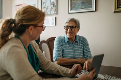 social worker assessing elderly person