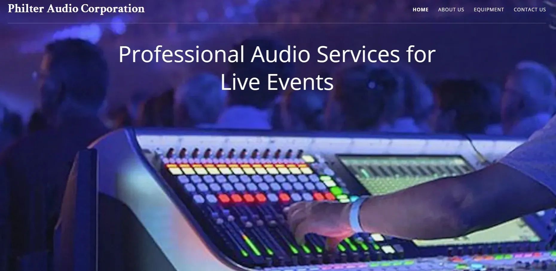 Audio engineer adjusting soundboard at a live event.