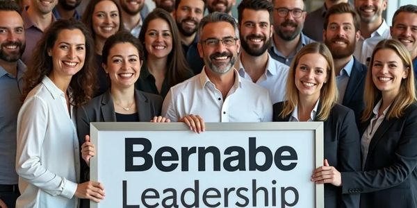 A diverse group of professionals holding a sign that says Bernabe Leadership.