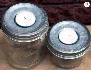 two mason jars with soy tea light candle in the lid