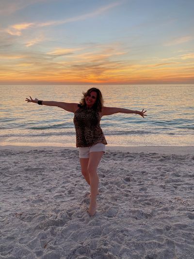 Angel Carlton embracing change and practicing her best self on the beach in Sarasota, Florida