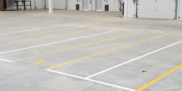 Pallet lane and safety zone.  Black and White Line Painting and Black & White Fine Line Painting.