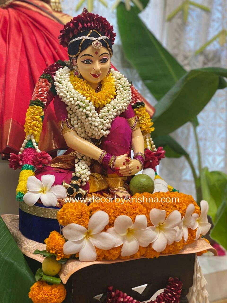Image of Closeup of Goddess Lakshmi Statue Decoration during festival of  Vara Mahalakshmi Vrata. Its festival to propitiate the Goddess Lakshmi.  Varalakshmi is one who grants boons.-ZW255351-Picxy
