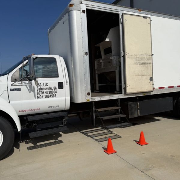 A picture of EcoCycle Services Group shredding truck.
