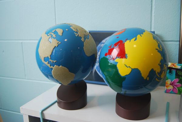 Montessori materials world globe and sandpaper globe