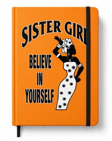Orange notebook with 'Sister Girl Believe In Yourself' and silhouette of a confident woman.