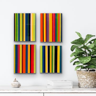 set of four striped high gloss paintings on hard board