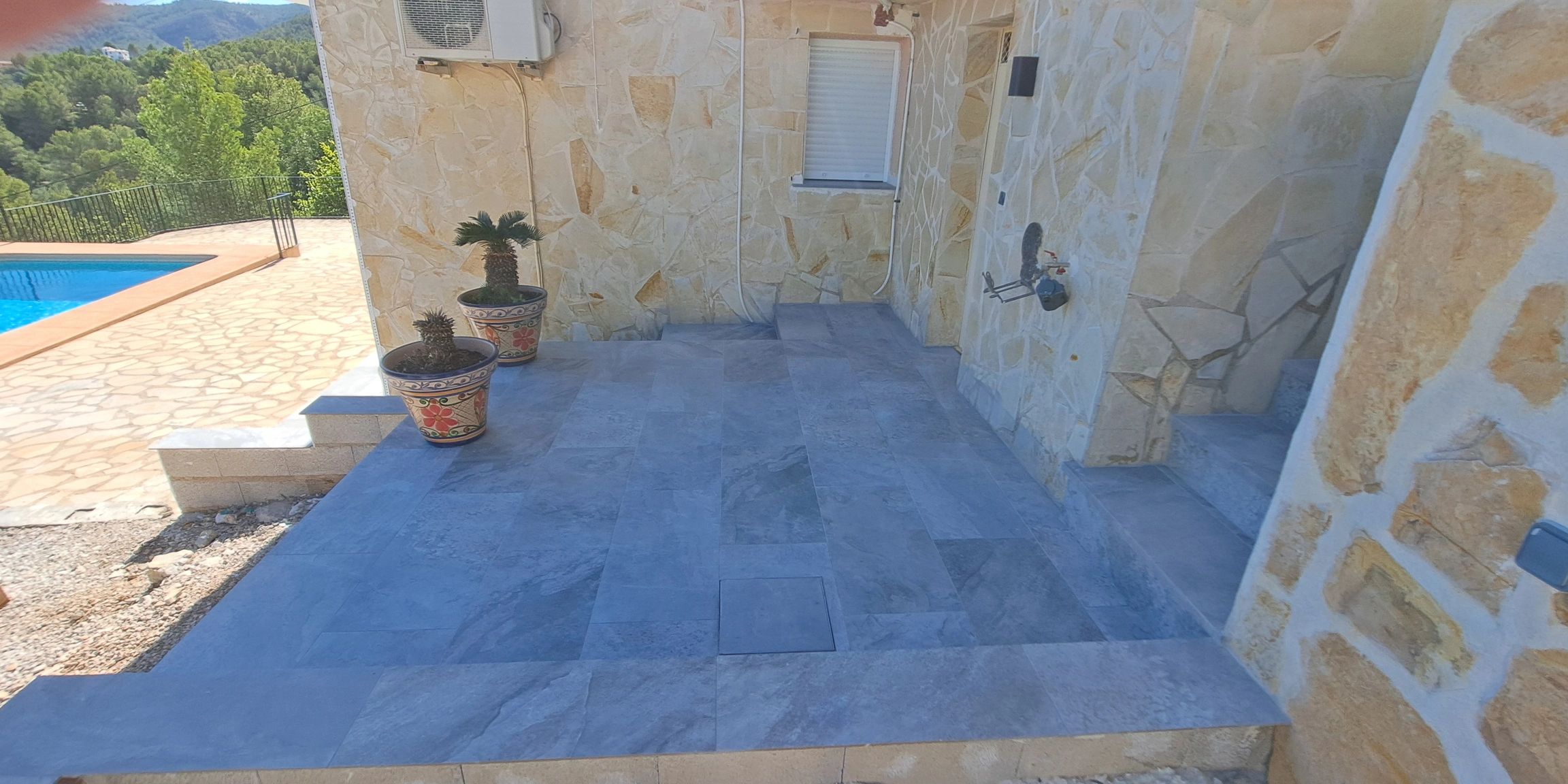 New formed terrace, stone render & tiling
