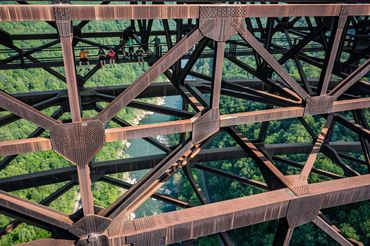 People in the superstructure of the New River Gorge Bridge.