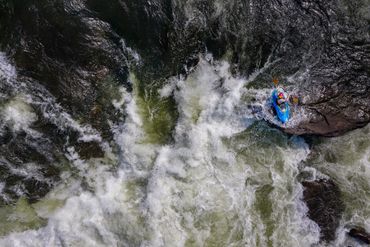 A kayaker in Sweet's Falls, Gauley River.
