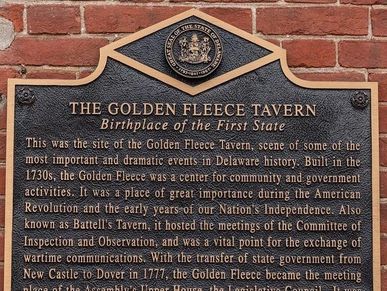 Historical plaque about The Golden Fleece Tavern, birthplace of Delaware's first state.