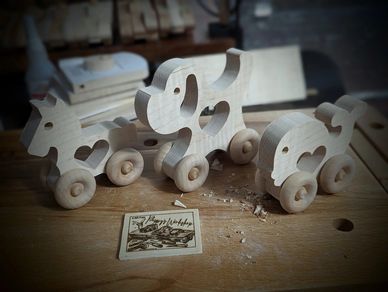 Dog, Horse, Whale wheeled animals with a heart cut out