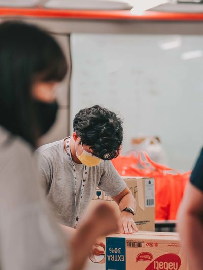 A person packing goods