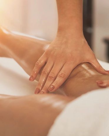 Close-up of a foot massage in progress.