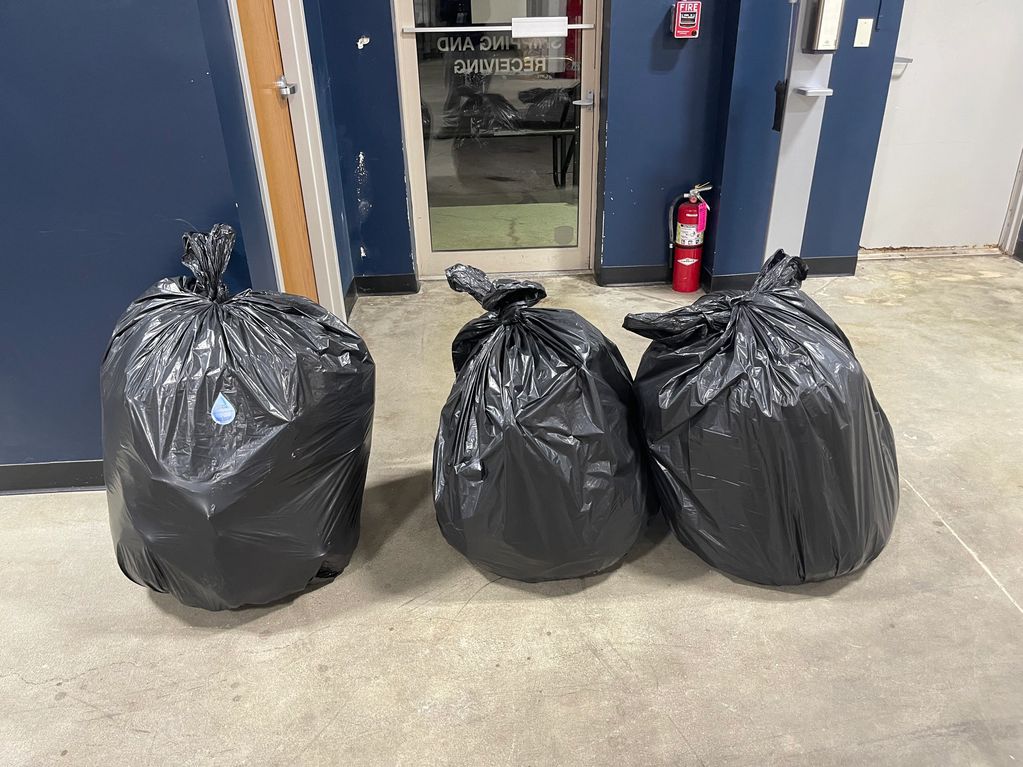 Bags on the right are trash. The large bag on the left is all the recyclables extracted