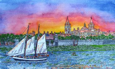 Sailboat near a vibrant sunset cityscape.