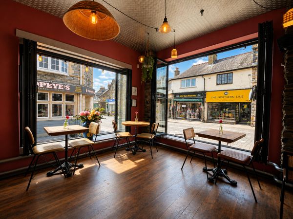 Restaurant in the centre of Windermere village with windows wide open