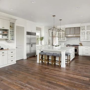 Kitchen and dining area with wooden flooring
