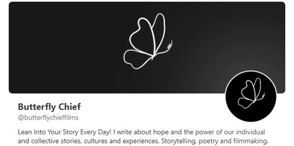 A logo of a white butterfly against a black background