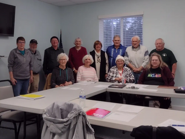 January 2024 Wave Writers. 
Back row left to right: Cathy, George, Tim, Sherri, Jennifer, Geo, Jim, 