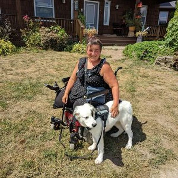 Oliver and his handler, Santana, after another great training session. Oliver is a deaf service dog