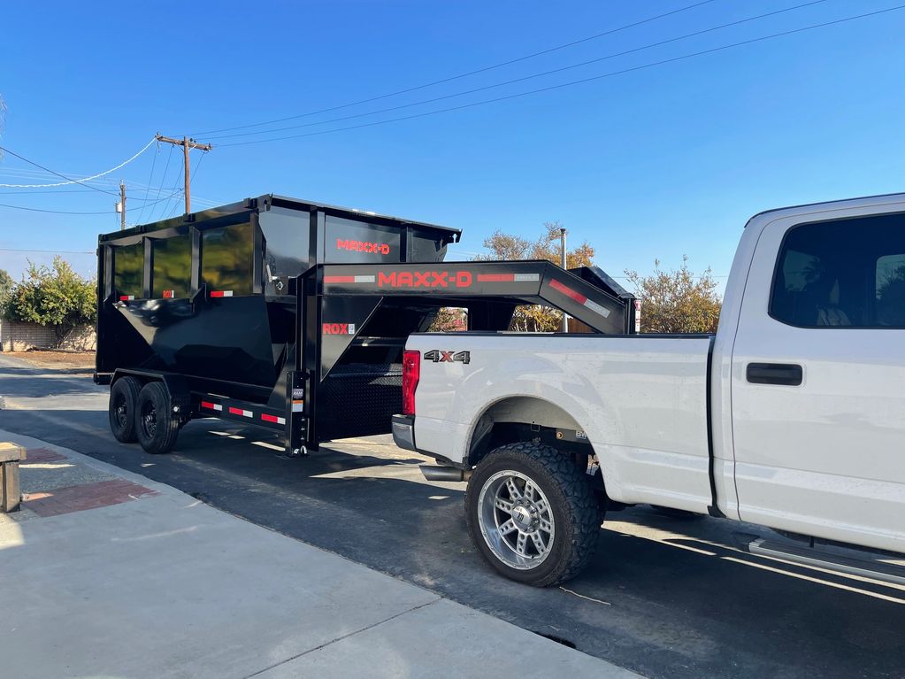 Junk Hauling Dumpster Trailer Rental - Toss and Tote