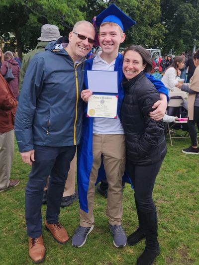 Aylit with her husband at their son's graduation from Brookline High