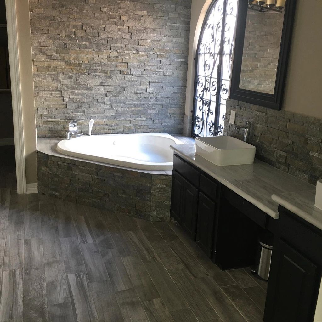  Floors replaced, new sinks added, new tub , tile work in front of the tub was also added.