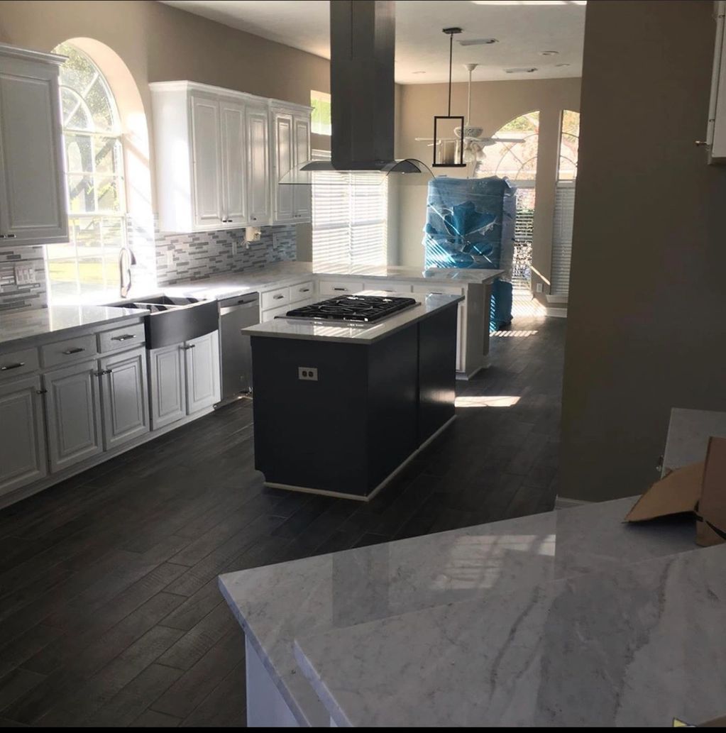  Floors were replaced, cabinets painted, backsplash replaced, new sink added, and walls painted